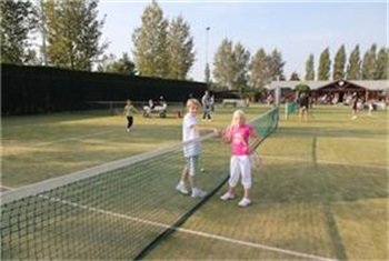 Ouder en kind tennis